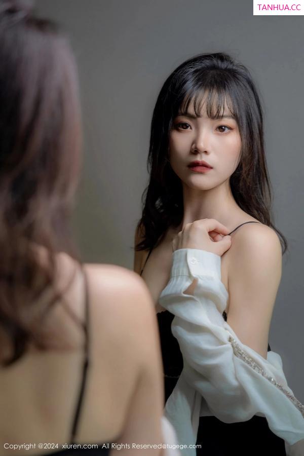   [XiuRen]高清写真图 2024.04.08 No.8353 唐安诺 美腿黑丝第54张图片